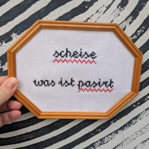 scheise was ist pasirt Stickbild